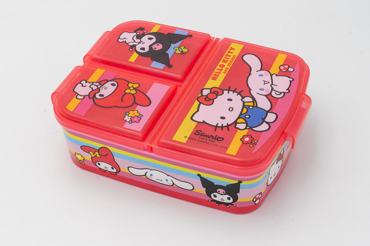 Fiambrera roja translúcida de Sanrio con tres compartimentos y dibujos de Hello Kitty y My Melody.