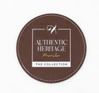 Runder brauner Untersetzer mit weißem Authentic-Heritage-Logo.