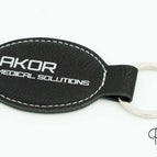 Oval 58x40 mm / Schwarz - Silber