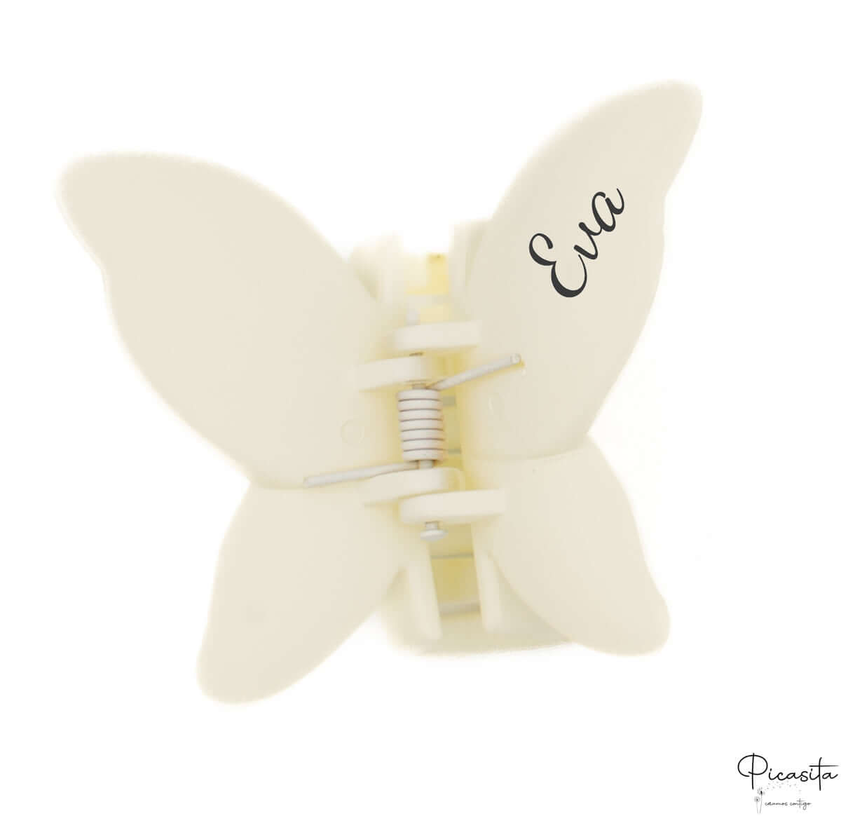 Pinza de pelo mariposa color crema con grabado láser personalizado con el nombre Eva.